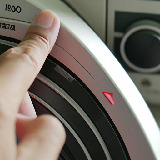A hand adjusting the speed controller knob of the fan