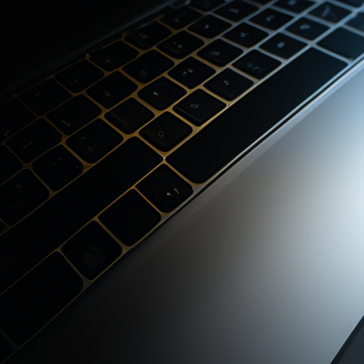 Close-up of the space black macbook pro with light reflections revealing subtle textures